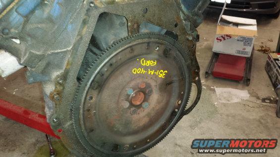 Ford 351M-400 engine block and flywheel. Yellow text reads 'FORD. 351-M-400'