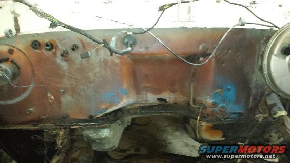 Engine bay firewall with rust and wiring