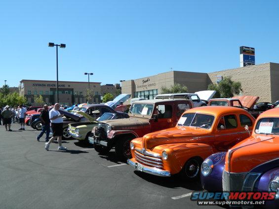 Orange hot rod with flames, front view