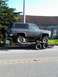 1991 Ford Bronco - This lifted Chevrolet K5 Blazer is being transported on a trailer.