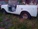 1991 Ford Bronco - This vintage convertible SUV appears to be a 1966 International Harvester Scout 800.