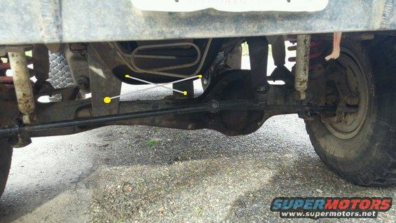 Rear axle, differential, shocks, and suspension parts of a truck