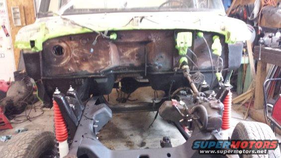 1978 Ford Bronco front end with engine removed, undergoing restoration