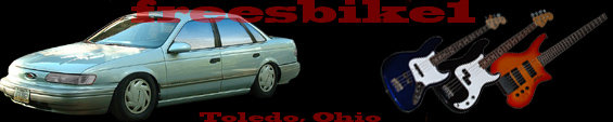 1992 Ford Taurus sedan, light blue, 3q front view