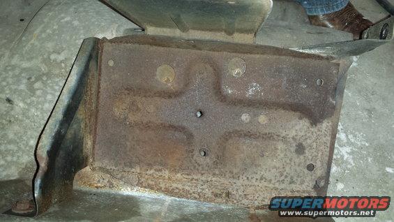 Rusted metal bracket, close-up view