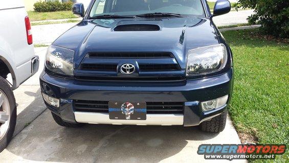 Front view of a 2005 Toyota 4Runner with blacked-out headlights and a skull license plate