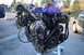 2007 Mazda 6 - Customized engine assembly with a turbocharger and aftermarket purple valve cover is displayed outdoors.