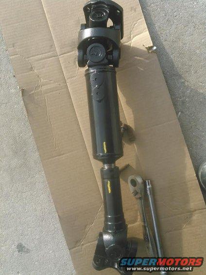 19.jpg brand new driveshaft thanks to a local company called Precision Shaft Technology. they did an excellent job on it and very easy to work with. cost me $300 and it uses 1350 joints.  

its a few inches shorter than stock. when I measured from axle to transfercase and vehicle sitting with full weight, I THINK it turned up being 25-26 inches. it also has 3&quot; of lift in the back and E4OD tranny.

