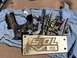 1993 Ford Bronco - Various engine components and a "5.0L V8" identification plate are laid out on a blue cloth.