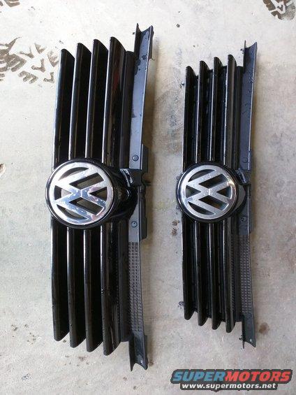 Two black Volkswagen grilles with chrome emblems