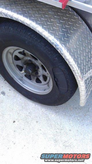 Aftermath of Plan B. The bulge popped a mile or two after I noticed it but it's still holding air. When rotating the tire is noticably out of round. Other motorists were apparently too careless or oblivious to notice the giant bulge in my tire, as they drove by in the lane directly next to it.