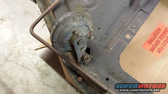 Horn assembly on metal frame with SuperMotors logo