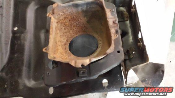 Rusted headlight bucket assembly with mounting brackets
