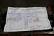 1979 Ford Bronco - A 'PAID' service document from Bearing Service Company is laid on top of an engine block.