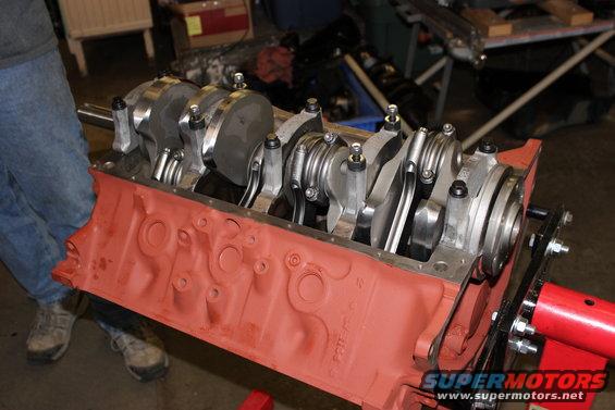 Engine block with crankshaft and connecting rods installed, mounted on an engine stand