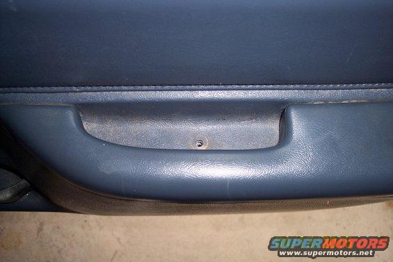 Blue interior door handle and panel