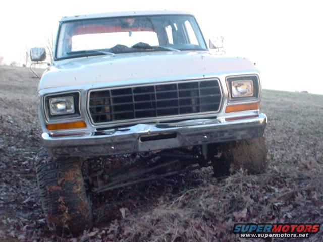 Front view of a 1979 Ford Bronco with a chrome grille and square headlights
