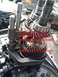 1993 Mercury Tracer - Close-up view of transmission gears and linkage, with text indicating 'Escort gears are not and they happen to be stronger!'