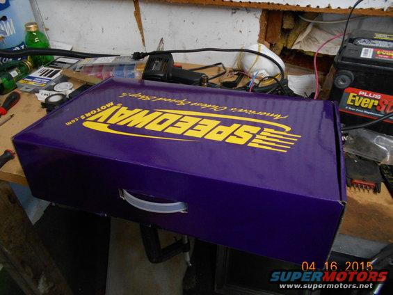Purple Speedway Motors box with yellow logo and text