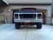 1978 Ford Bronco - This lifted Ford truck is missing its grille and headlights, showing its engine bay from the front.