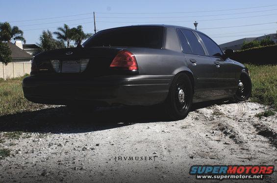 Dark gray 2005 Ford Crown Victoria sedan, rear view