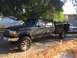 1993 Ford F-350 - This 1993 Ford F-350 crew cab pickup features a utility bed and appears to be in good condition.