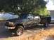 1993 Ford F-350 - This 1993 Ford F-350 crew cab pickup features a utility bed and aftermarket wheels.