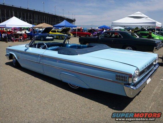 Light blue 1961 convertible, front quarter view
