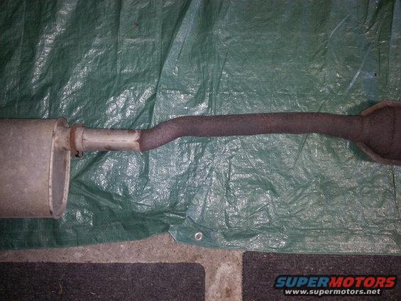 Not rocket science to add 10 inches of bigger pipe and lop off that three inches of 1 and seven eights restrictive pipe. It allows you to run not only any 2 and a quarter inch muffler, but also a later model B body tailpipe, which fits perfectly.