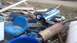 2011 Yamaha GRIZZLY 660 - Scrap pile with parts from multiple lawn tractors, including a Craftsman and a blue tractor with 'LOT 145 FI' visible.