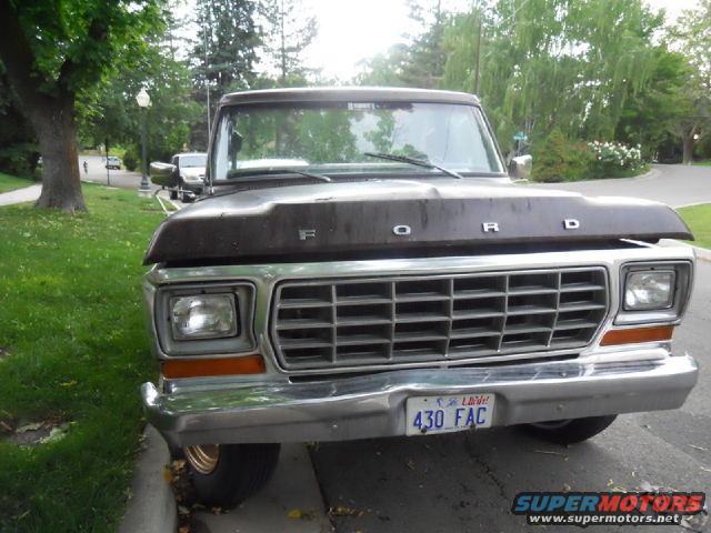Front view of a 1979 Ford F-150 truck with hood open. License plate reads 430 FAC