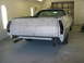 1973 Ford Ranchero - This 1973 Ford Ranchero is in primer, ready for paint, showing its rear end and dual exhaust pipes.