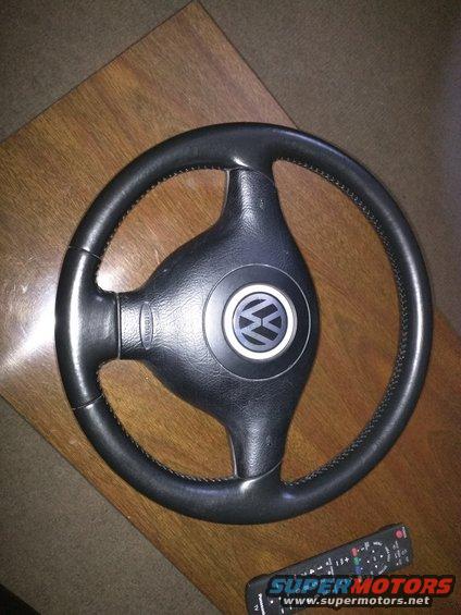 Black Volkswagen steering wheel with airbag logo