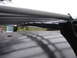 1964 Volkswagen Beetle - Roof rack installed on a vehicle's roof, showing the mounting hardware and rack bars.