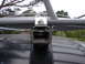 1964 Volkswagen Beetle - A close-up view of a roof rack mounting bracket, showing the hardware used for attachment.