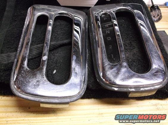 Two chrome shifter console trim pieces, one with P, R, N, D, 2, 1 indicator
