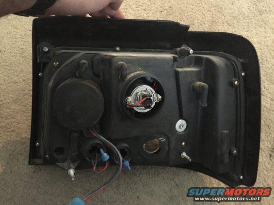 Headlight assembly with bulb socket and wiring