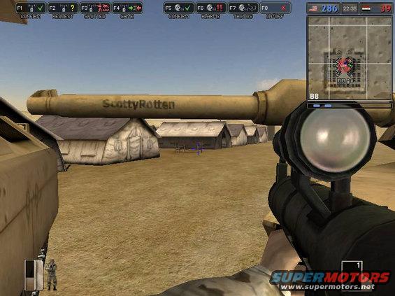 Video game scene with weapon scope, barrel labeled ScottyRotten, tents, and desert landscape