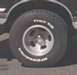 1978 Ford Bronco - Close-up of a tire and wheel assembly on a vehicle.