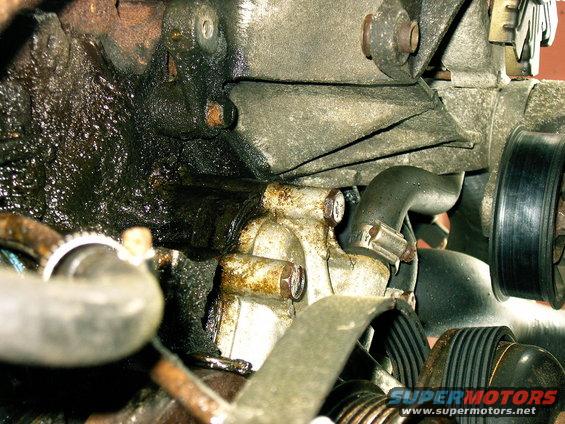 Engine part with oil leak and pulley system