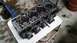 1985 Ford Escort - A used engine cylinder head is shown, indicating internal engine work or repair.