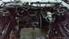 1985 Ford Escort - Car's engine bay during restoration, with wiring and brake components visible.