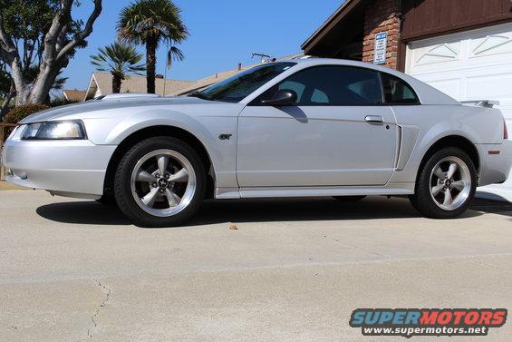 Silver 2002 Ford Mustang GT parked in driveway