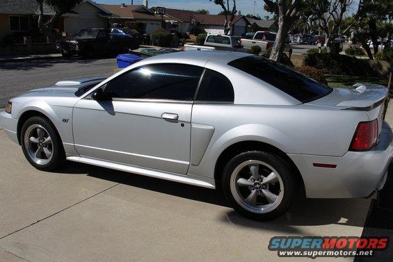 Silver 2002 Ford Mustang GT coupe, side view