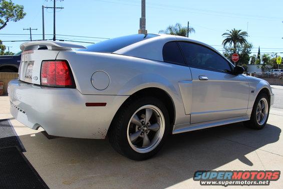 Silver 2002 Ford Mustang rear quarter view with spoiler
