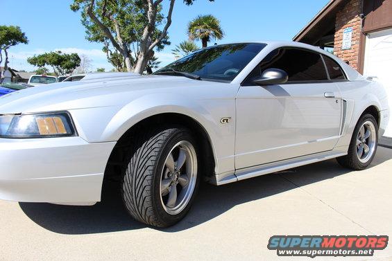 Silver 2002 Ford Mustang GT coupe parked outside