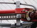 1964 Volkswagen Beetle - A hi-lift jack is mounted to a vehicle's roof rack system.