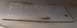 2005 Ford F-250 - Vehicle identification plate showing stamped alphanumeric characters.