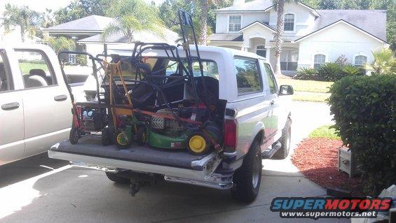 I traded a 26 gallon Craftsman oilless air compressor for 3 mowers and 2 edgers, this is how they fit in the back of a Bronco.