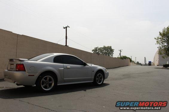 Silver 2002 Ford Mustang coupe, rear quarter view